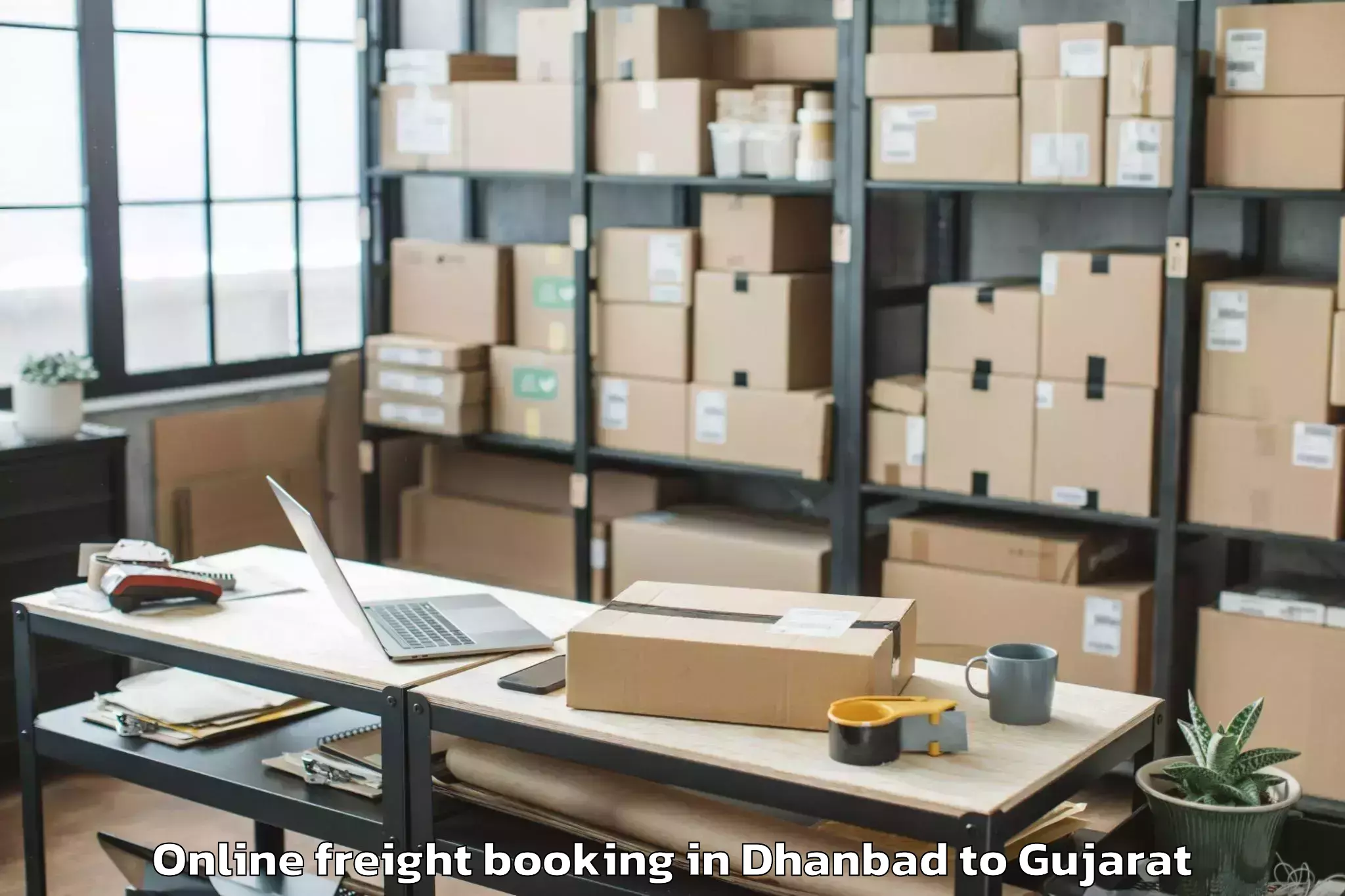 Discover Dhanbad to Karjan Online Freight Booking